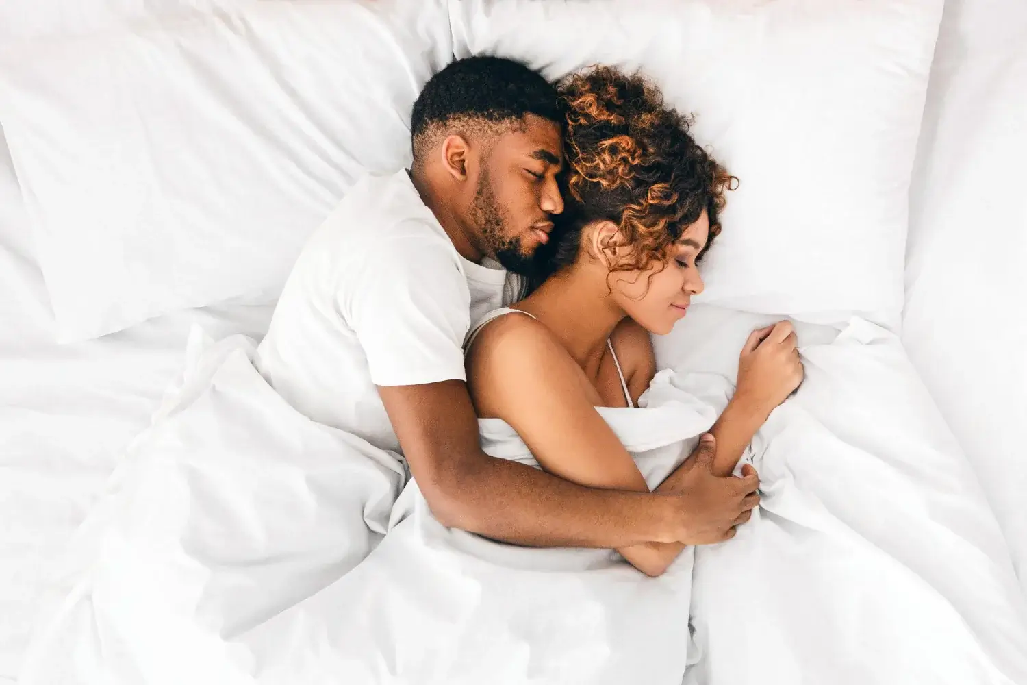 couple sleeping in bed