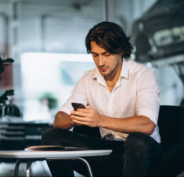man looking phone